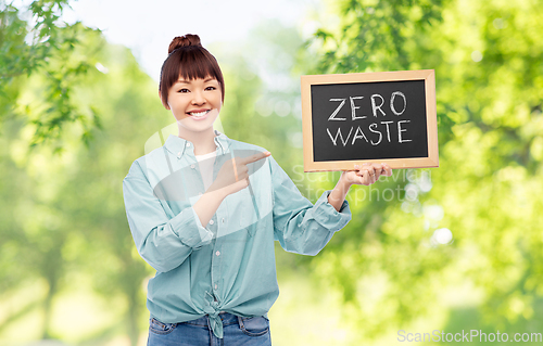 Image of asian woman holds chalkboard with zero waste words