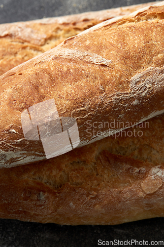 Image of close up of baguette bread on table