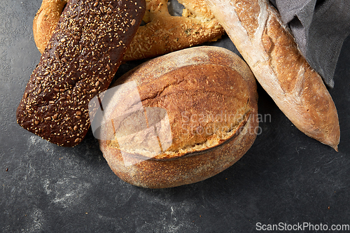 Image of close up of different bread on kitchen towel