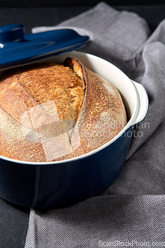 Image of homemade craft bread in ceramic baking dish