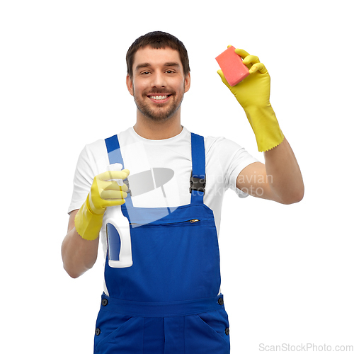 Image of male cleaner cleaning with sponge and detergent