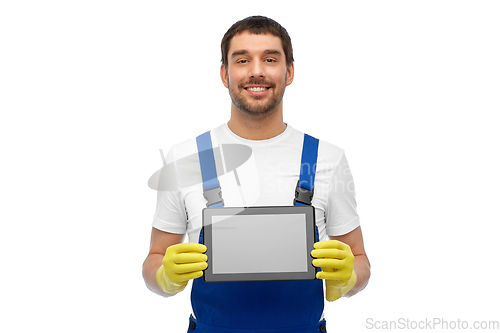 Image of happy male worker or cleaner showing tablet pc