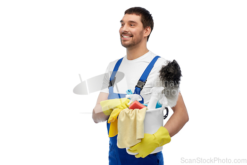 Image of male cleaner in overall with cleaning supplies