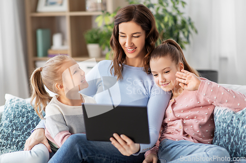 Image of mother and children having video call on tablet pc