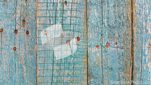 Image of Texture of old wooden fence with rusty nails