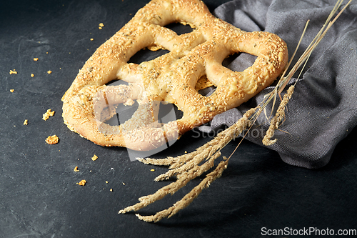 Image of close up of cheese bread on kitchen table