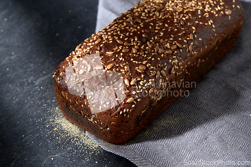 Image of homemade craft bread with seeds on table