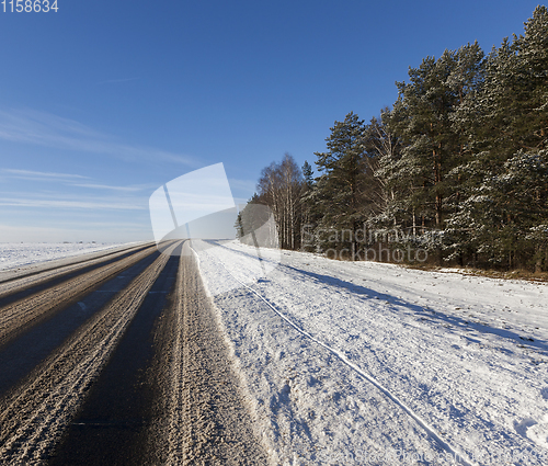 Image of Asphalt road in winter