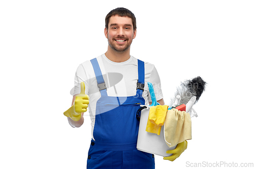 Image of male cleaner in overall with cleaning supplies