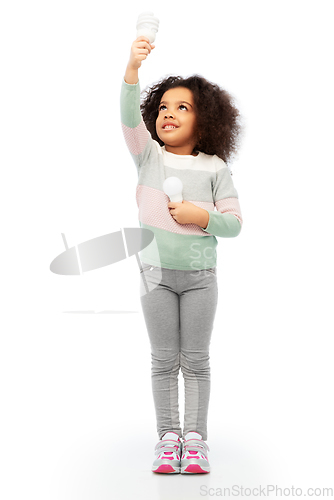 Image of african american girl with different light bulbs