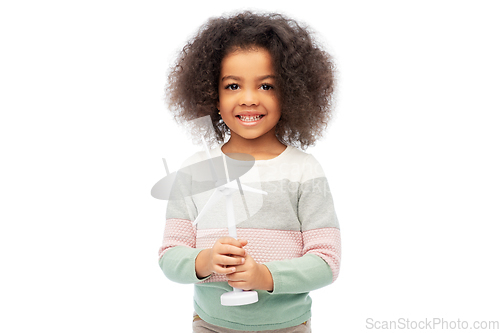 Image of happy african american girl with toy wind turbine