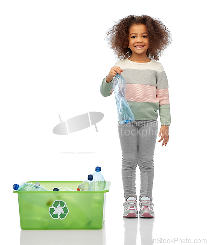 Image of happy african american girl sorting plastic waste