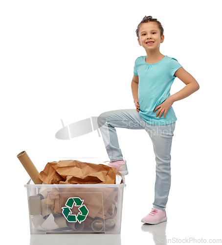 Image of smiling girl sorting paper waste