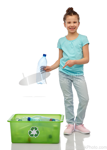 Image of smiling girl sorting plastic waste