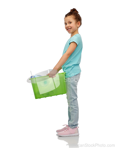 Image of smiling girl sorting plastic waste