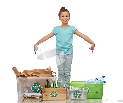 Image of happy girl sorting paper, metal and plastic waste