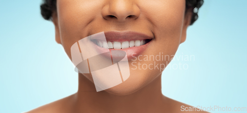 Image of close up of face of smiling african american woman