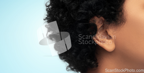 Image of close up of african american woman's ear