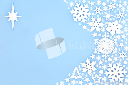 Image of Christmas Star of Bethlehem and Snowflake Blue Background 