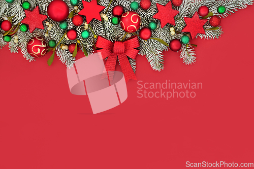 Image of Christmas Snow Fir Bow and Bauble Background