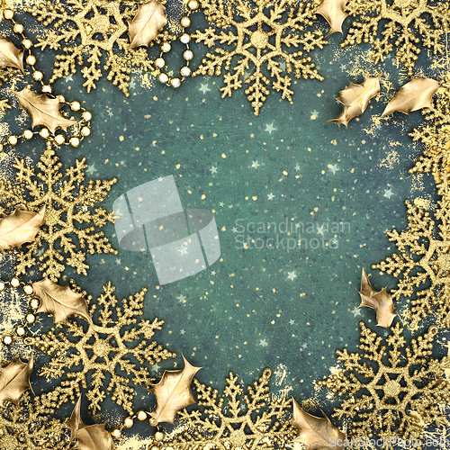 Image of Christmas Gold Holly and Snowflake Background Border