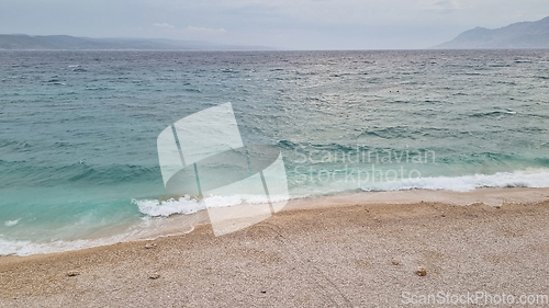 Image of Beautiful shore of the Adriatic Sea. Bay view with cloudscape