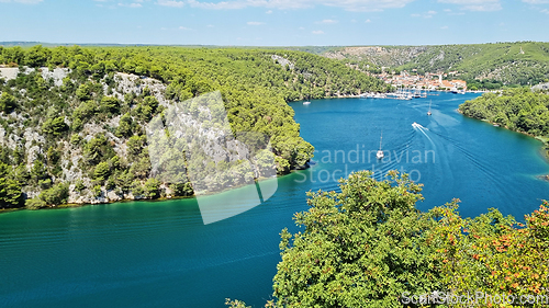 Image of Aerial view of Skradin town on the Krka River in Croatia. View of boats on Krka river, Croatia. Summer day