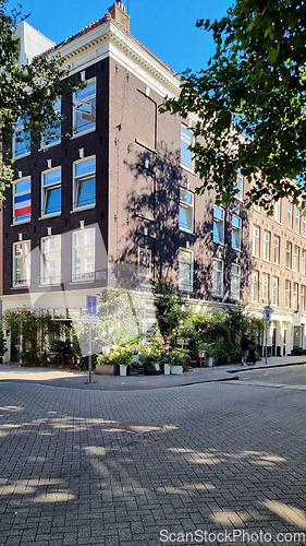 Image of Typical houses in Amsterdam Netherlands. Old European city summer landscape