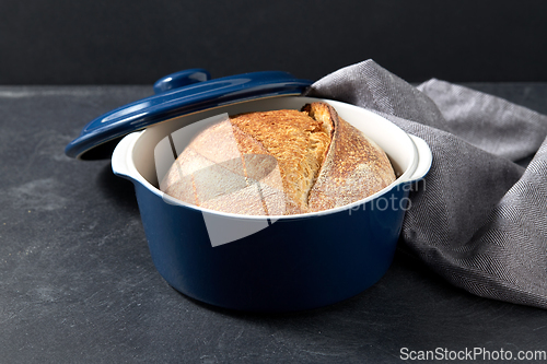 Image of homemade craft bread in ceramic baking dish