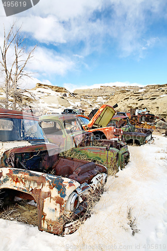 Image of abandoned cars in junkyard