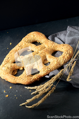 Image of close up of cheese bread on kitchen table