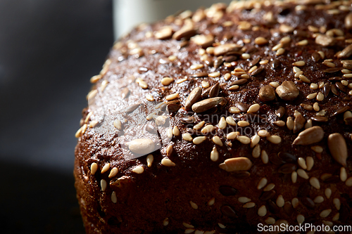 Image of homemade craft bread with seeds on table