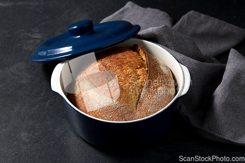 Image of homemade craft bread in ceramic baking dish