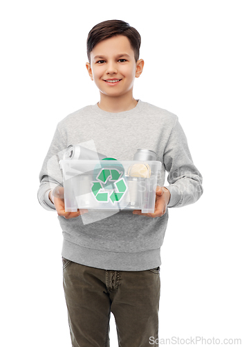 Image of smiling boy sorting metallic waste