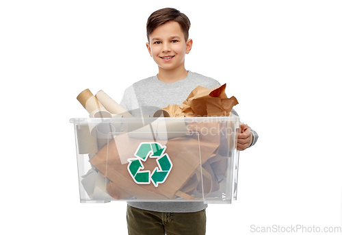 Image of smiling boy sorting paper waste