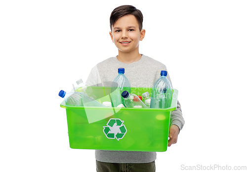 Image of smiling boy sorting plastic waste