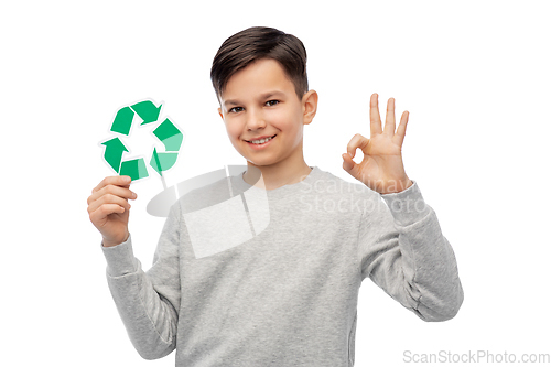 Image of happy boy holding green recycling sign showing ok