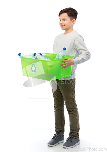 Image of smiling boy sorting plastic waste