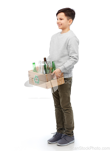 Image of smiling boy with wooden box sorting glass waste