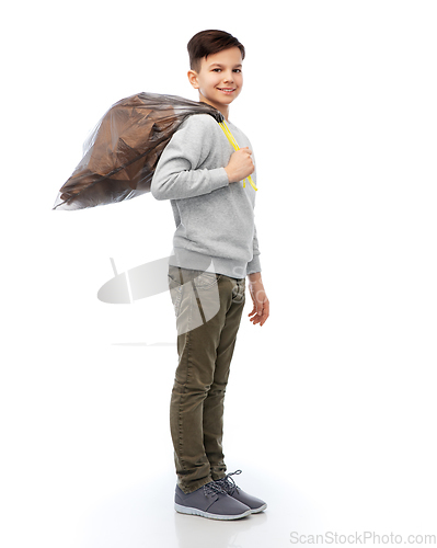 Image of smiling boy with paper garbage in plastic bag