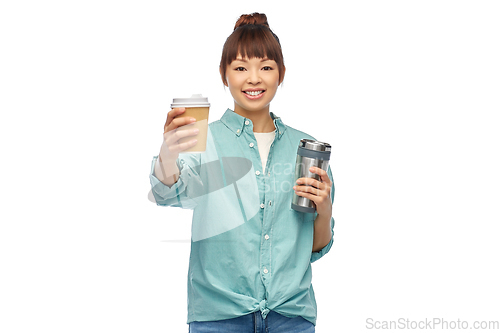 Image of woman with thermo cup or tumbler for hot drinks