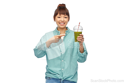 Image of happy smiling asian woman with can drink