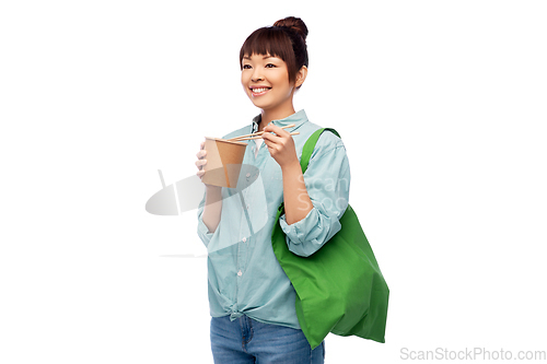Image of asian woman with reusable bag for food and wok