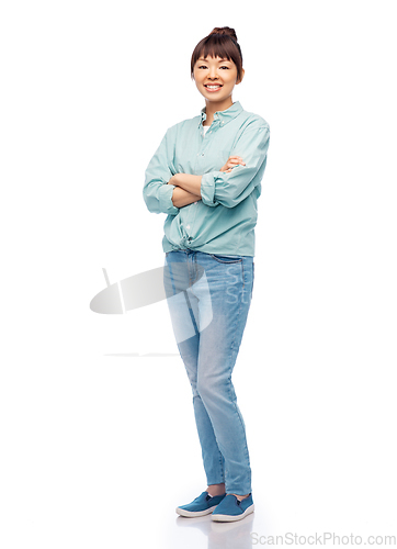 Image of happy asian woman with crossed arms