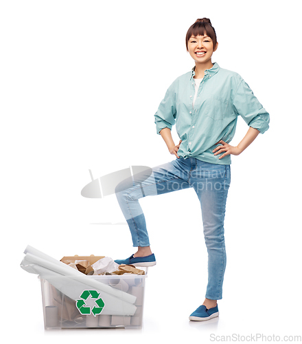 Image of happy smiling asian woman sorting paper waste