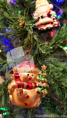 Image of Decorative toy of snowball close-up on christmas tree