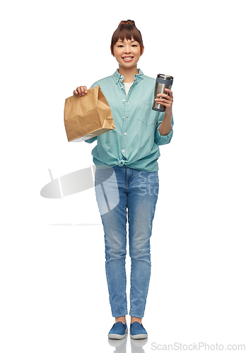 Image of woman with thermo cup or tumbler for hot drinks