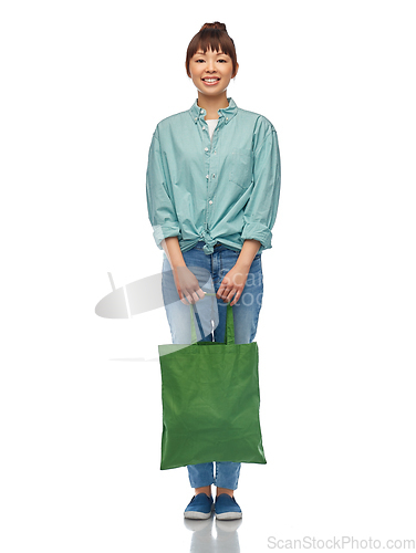 Image of woman with reusable canvas bag for food shopping