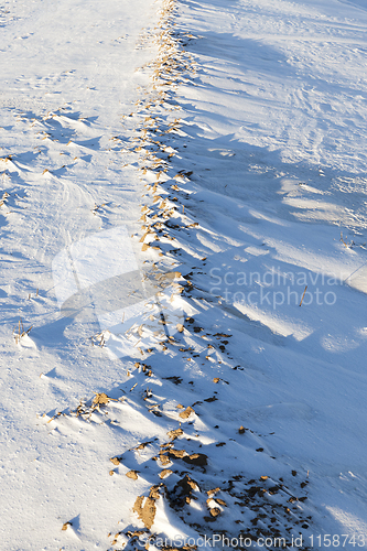 Image of land covered with snow, close-up