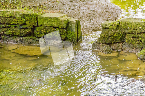 Image of old stone wall with gap